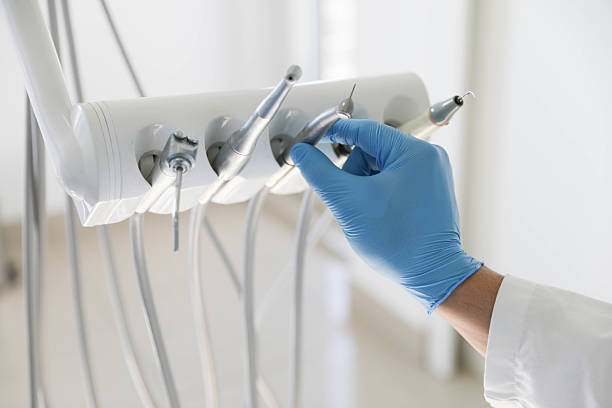 Professional Tooth Extraction technician working in Moriches, NY